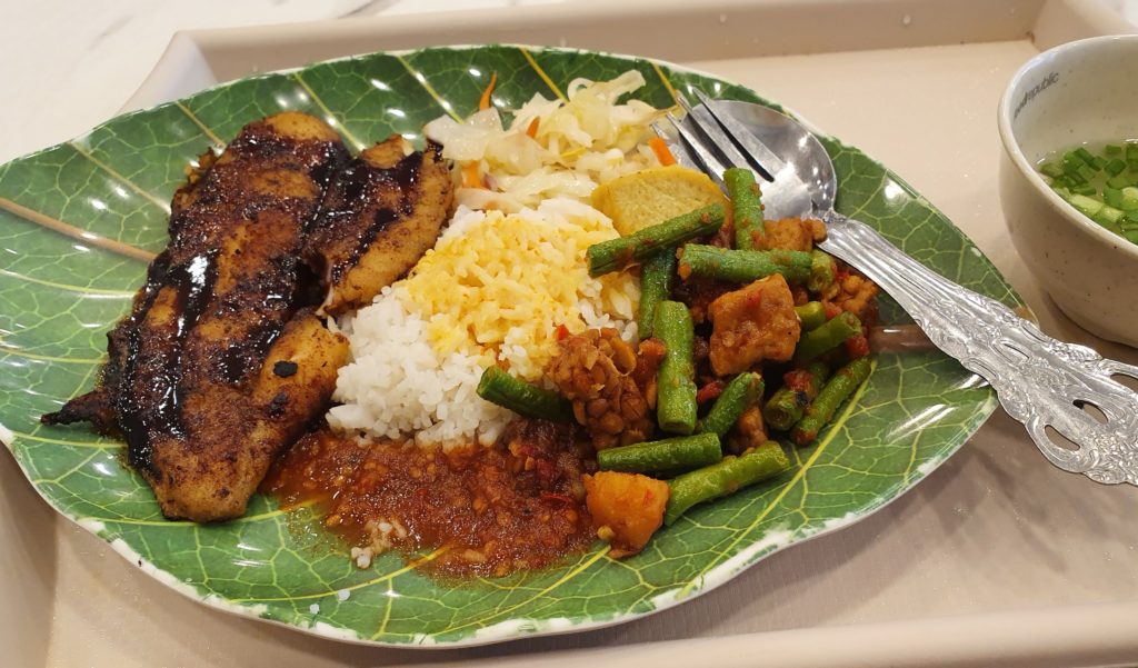 Baked dory or ikan bakar with rice at a food court