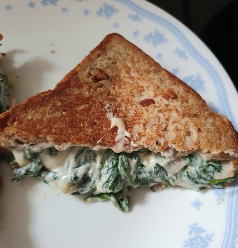 Cheesy ricotta spinach toast with a twist